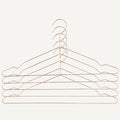 Hang is a minimalistic metal metal hanger that takes up less room in your closet, enabling you to store more clothes in the same amount of space. Made in wire, with different colour options.