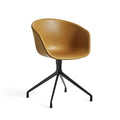 Featuring a swivel base in steel, the About A Chair AAC21 conveys a more formal expression than its wooden-legged counterparts from the series. The distinctive curved shell provides a soft, unified silhouette and legs that fan out from the centred base. The cast aluminium swivel base is available in polished or powder coated finishes, and the polypropylene shell comes in diverse colour and upholstery options, allowing a multitude of design combinations that make this series so versatile.