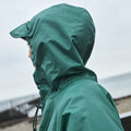 A new wet-weather friend, the Mono Rain Poncho is made in lightweight, water-resistant fabric and features a drawstring tie and peaked hood for superior protection. It packs easily into the front pouch and is available in different colours.