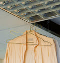 Hang is a minimalistic metal metal hanger that takes up less room in your closet, enabling you to store more clothes in the same amount of space. Made in wire, with different colour options.