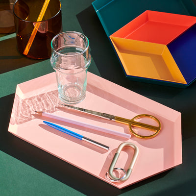 Clara von Zweigbergk‘s background as a graphic designer is clearly evident in her Kaleido tray collection for HAY, where her intuitive sense of colour combination manifests itself in a myriad of shapes and shades. This series of steel, geometrically-shaped trays can be used individually as bursts of unexpected colour or stored inside each other to create functional and imaginative constellations.