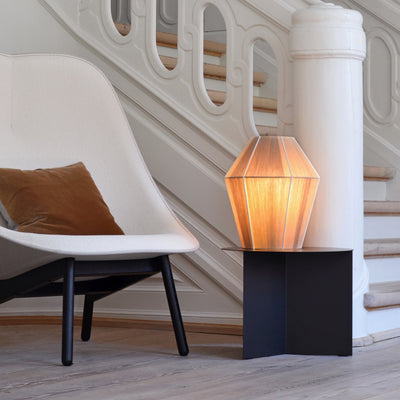 HAY’s Slit Table is a geometric steel side table inspired by paper origami techniques. The slim frame appears folded beneath the tabletop, creating a simple yet sculptural form that is reminiscent of traditional Japanese paper art. The Slit Table is available in a selection of different shapes and sizes and is offered in a variety of contemporary colours and finishes. Compact and versatile, it can be used on its own or arranged in clusters in diverse private or public settings.