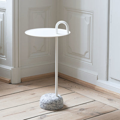 Shane Schneck’s Bowler Table is a compact side table that is ideal for small spaces. The single tube that extends upwards creates a defined profile, which doubles as a functional handle too. The stem, handle and tray are made in powder coated steel, with a solid granite base that provides stability, yet it is still lightweight enough to move around. Bowler comes flat packed and is easy to assemble, making it suitable for all kinds of domestic and corporate environments.