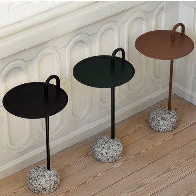 Shane Schneck’s Bowler Table is a compact side table that is ideal for small spaces. The single tube that extends upwards creates a defined profile, which doubles as a functional handle too. The stem, handle and tray are made in powder coated steel, with a solid granite base that provides stability, yet it is still lightweight enough to move around. Bowler comes flat packed and is easy to assemble, making it suitable for all kinds of domestic and corporate environments.