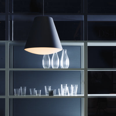 An elemental looking light available as either a small or large pendant. The fabric cord comes with a magnetic moulded ceiling cap in a textured finish. The ABS convex diffuser emits a warm, even illumination. 