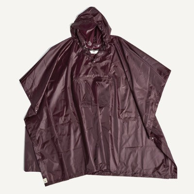 A new wet-weather friend, the Mono Rain Poncho is made in lightweight, water-resistant fabric and features a drawstring tie and peaked hood for superior protection. It packs easily into the front pouch and is available in different colours.